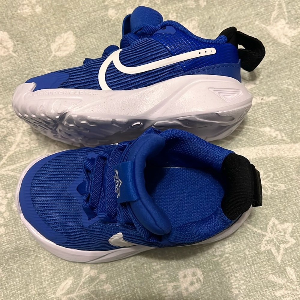 Toddler Nikes, New without tags size 6, never worn.